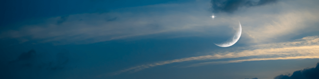 New Moon in the twilight sky.
